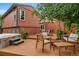 Multi-level deck with lounge chairs, fire pit, dining table, and jacuzzi, great for outdoor entertaining at 17372 E Prentice Cir, Centennial, CO 80015