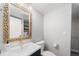 Bathroom featuring a decorative mirror and modern fixtures at 17372 E Prentice Cir, Centennial, CO 80015