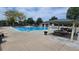 Community pool offering a refreshing oasis with ample seating and shaded areas for relaxation and recreation at 17372 E Prentice Cir, Centennial, CO 80015