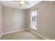 Well lit bedroom with large window and neutral decor, creating a calm and welcoming atmosphere at 2374 S University Blvd # 202, Denver, CO 80210