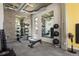 Well-equipped gym with weights, machines, mirrors and good space for workouts at 2374 S University Blvd # 202, Denver, CO 80210