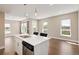 Modern kitchen with white countertops, stainless steel appliances, and sleek cabinetry at 2374 S University Blvd # 202, Denver, CO 80210