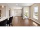 Modern living space with hardwood floors, kitchen access, and lots of natural light at 2374 S University Blvd # 202, Denver, CO 80210