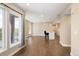 Bright living room featuring modern finishes, wood floors, and a kitchen island with seating at 2374 S University Blvd # 202, Denver, CO 80210