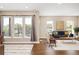Inviting living room with large windows, hardwood floors, and modern furnishings at 2374 S University Blvd # 202, Denver, CO 80210