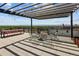 Relaxing rooftop deck with a fire pit and comfortable seating at 2374 S University Blvd # 202, Denver, CO 80210