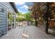 Wood back deck with a sliding glass door and fenced yard, ideal for relaxation at 517 Chiswick Cir, Highlands Ranch, CO 80126