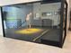 Experience golf indoors with this state-of-the-art golf simulator for year-round play and practice at 517 Chiswick Cir, Highlands Ranch, CO 80126