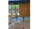 Relaxing indoor hot tub with tiled steps, providing a soothing experience and a view of the outdoors at 517 Chiswick Cir, Highlands Ranch, CO 80126