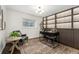 Charming office space features a unique accent wall, modern desk, and a cozy seating area at 517 Chiswick Cir, Highlands Ranch, CO 80126