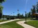 Scenic community tennis courts surrounded by lush landscaping, perfect for outdoor recreation and sports at 517 Chiswick Cir, Highlands Ranch, CO 80126