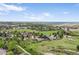 Aerial view of a community with greenery, offering a serene and picturesque setting with ample space at 225 Berthoud Way, Golden, CO 80401