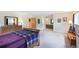 Large main bedroom featuring carpet, two windows, and a dresser with a mirror at 225 Berthoud Way, Golden, CO 80401