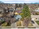Aerial view of single Gathering home with bright red front door at 2237 S Lowell Blvd, Denver, CO 80219