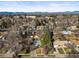 A high aerial view showcases the neighborhood's mature trees and single-Gathering homes at 2237 S Lowell Blvd, Denver, CO 80219