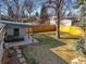 Overhead view of the backyard featuring a covered patio and wooden fence at 2237 S Lowell Blvd, Denver, CO 80219