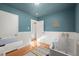 Bright Bedroom featuring hardwood floors, ample space and white trim details at 2237 S Lowell Blvd, Denver, CO 80219