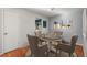 Cozy dining room with a round table, comfortable seating, and lots of natural light at 2237 S Lowell Blvd, Denver, CO 80219