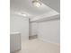 Functional laundry room with tile floors and ample space, offering convenience and practicality at 2237 S Lowell Blvd, Denver, CO 80219