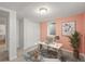 Bright office with a desk, a large window, neutral tones, and a closet for storage at 2237 S Lowell Blvd, Denver, CO 80219