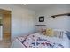 Bedroom featuring a closet, stylish shelving, and cozy, comfortable decor at 5936 Turnstone Pl, Castle Rock, CO 80104
