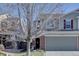 Charming two-story home with a two-car garage and a brick entryway at 5936 Turnstone Pl, Castle Rock, CO 80104