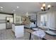 A spacious kitchen area with stainless steel appliances open to living space at 5936 Turnstone Pl, Castle Rock, CO 80104