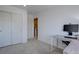 Office space featuring a closet, large window, and a modern desk setup at 5936 Turnstone Pl, Castle Rock, CO 80104