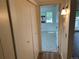 Bedroom featuring a closet, window and view to another room at 8555 Fairmount Dr # A108, Denver, CO 80247