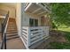 Condo exterior features a balcony, natural light, and staircase access to unit 108 at 8555 Fairmount Dr # A108, Denver, CO 80247