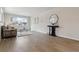 Bright living room with hardwood floors, modern decor, and large windows offering plenty of natural light at 3550 Fairfax St, Denver, CO 80207
