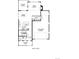 Detailed first floor plan showing the layout including the kitchen, dining, garage, and outdoor living area at 5604 Grandville Ave, Longmont, CO 80503