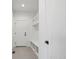 Clean mudroom area featuring built-in bench, shelving, and convenient access at 5604 Grandville Ave, Longmont, CO 80503