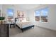 Bedroom with a queen bed and lovely view at 9524 Fork Bluff Pt, Lone Tree, CO 80124