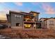 Modern home exterior; two-story, gray siding at 9524 Fork Bluff Pt, Lone Tree, CO 80124