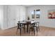 Basement game room with table and chairs, offering a space for entertainment at 9524 Fork Bluff Pt, Lone Tree, CO 80124