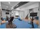 Basement home gym with various equipment at 9524 Fork Bluff Pt, Lone Tree, CO 80124