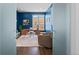 Private home office with wood desk and built-in shelving at 9524 Fork Bluff Pt, Lone Tree, CO 80124