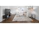 Cozy living room with sectional sofa and rug at 9524 Fork Bluff Pt, Lone Tree, CO 80124