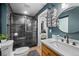 Stylish bathroom featuring a modern shower, sleek vanity, and contemporary design at 379 Rainbow Rd, Idaho Springs, CO 80452