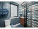 Stylish bathroom featuring patterned tile walls, a modern vanity, and a glass-enclosed shower at 379 Rainbow Rd, Idaho Springs, CO 80452