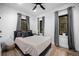 Comfortable bedroom with neutral tones, hardwood floors, and generous natural light at 379 Rainbow Rd, Idaho Springs, CO 80452