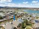 Community aerial view with proximity to a lake, showcasing the desirable neighborhood setting at 7158 W Belmont Dr, Littleton, CO 80123