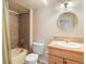 This bathroom features a shower-tub combo and generous countertop space at 7158 W Belmont Dr, Littleton, CO 80123