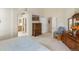 Bright main bedroom with ensuite bath and walk-in closet provides a spacious and comfortable retreat at 7158 W Belmont Dr, Littleton, CO 80123