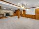 Finished basement with stone fireplace and wood trim at 1394 E Panama Dr, Centennial, CO 80121
