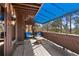 Relaxing balcony space with awning, stylish outdoor furniture, and scenic mountain views at 2851 Interlocken Dr, Evergreen, CO 80439