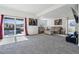 Spacious finished basement with large sectional sofa and access to backyard at 8086 S Grand Baker Way, Aurora, CO 80016