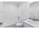 Clean bathroom with a shower/tub combo and modern vanity at 8086 S Grand Baker Way, Aurora, CO 80016