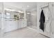 Elegant bathroom with double vanity and a large walk-in shower at 8086 S Grand Baker Way, Aurora, CO 80016